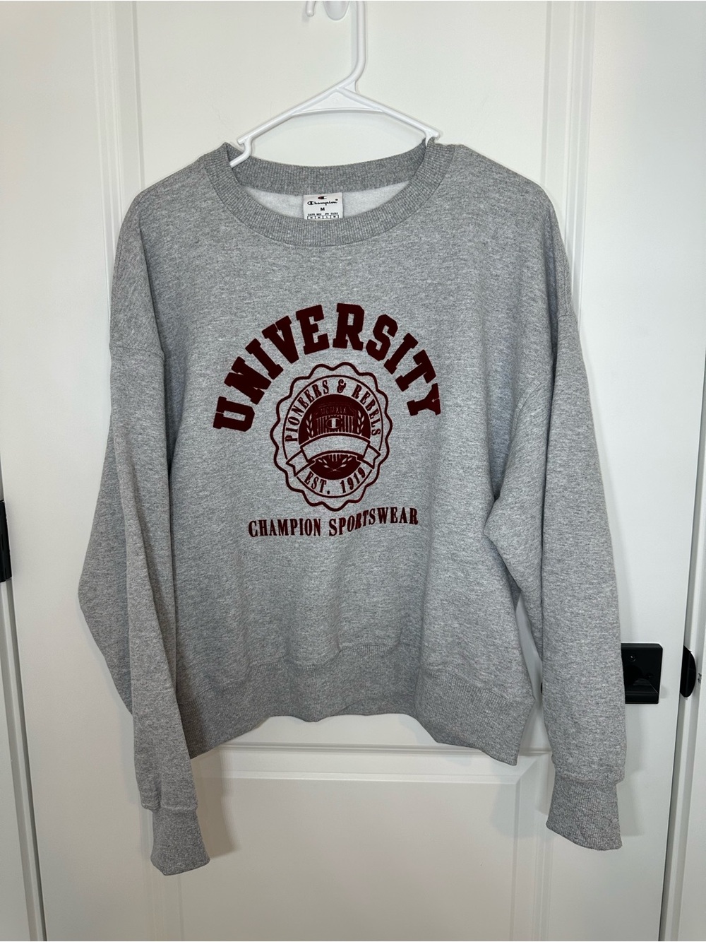 Champion Gray Crewneck Sweatshirt with Maroon University Graphic